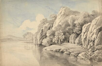 River Bank With High Rocks