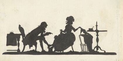 Silhouet van een echtpaar met kind in wieg