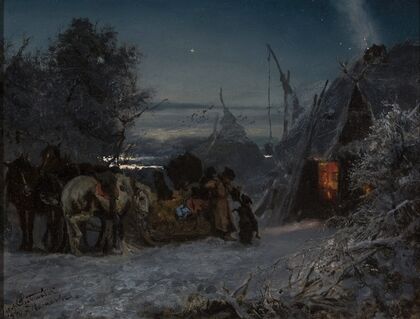 Sleigh in front of a hut at night