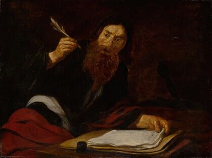 St. Paul writing at his desk