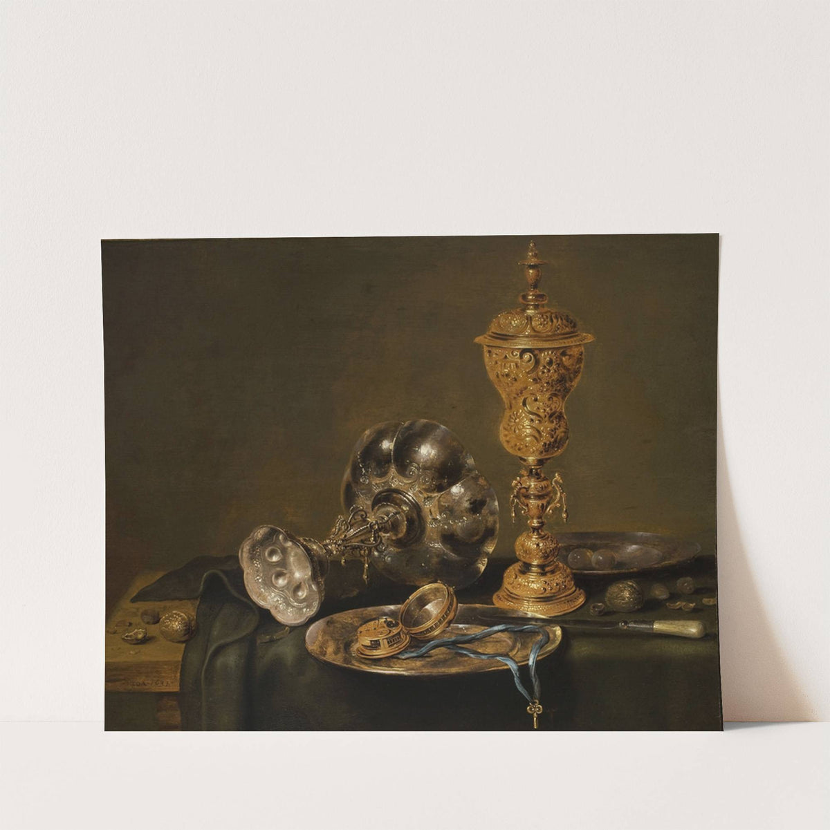 Still Life with Metal Vessels and a Watch on a Table by Willem Claesz Heda