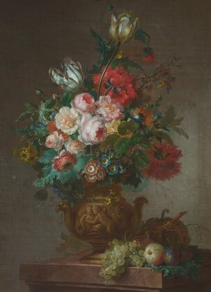 Still life with tulips and peonies in a vase on a ledge with fruit