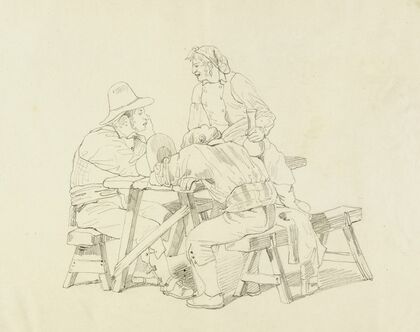 Trois hommes assis à une table