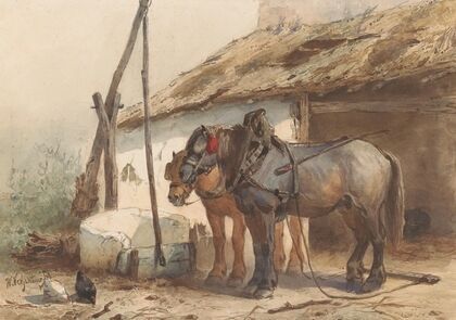 Twee paarden staand voor een stal