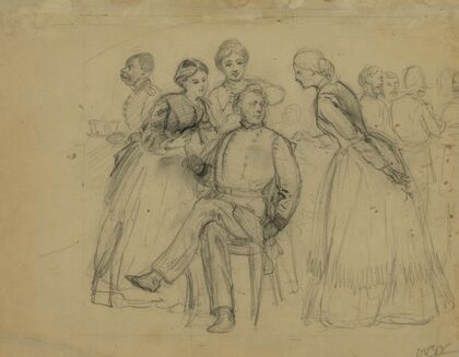 Two women trimming a man’s hair