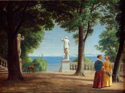View towards Kullen from a garden terrace with statues