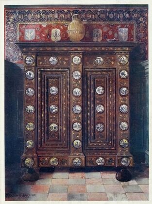 Walnut kas inlaid and with painted medallions of Delft ware