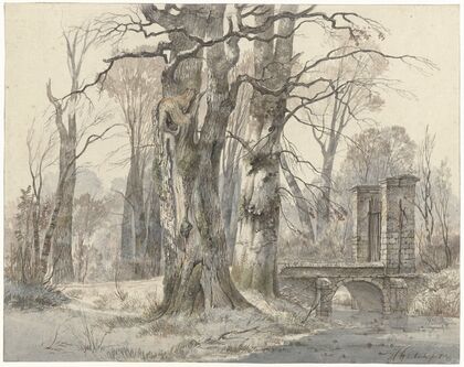 Winterlandschap met poort tussen bomen