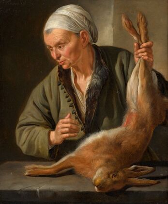 Woman presenting a hare