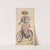 Woman riding bicycle by René Ackermann