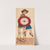 Woman seated on stool holding parasol with numbered concentric circle design on it by René Ackermann