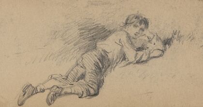 Young boy resting on the grass
