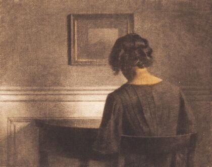 Young girl by a semi-circular table