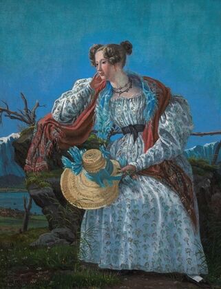 Young Woman Sitting in a Norwegian Landscape