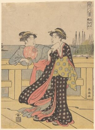 Young Women Enjoying the Fresh Air of the Evening on the Bridge