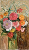 Zinnias and asters in a glass jar